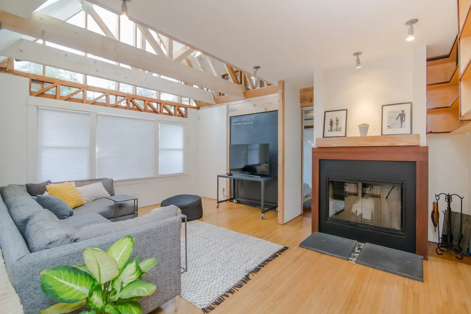 A bright finished attic room with exposed beams. Fort Wayne.